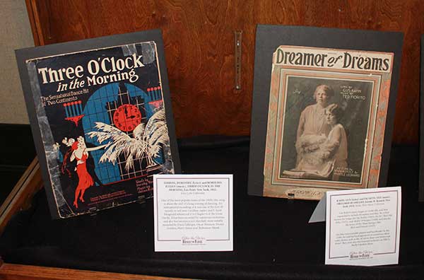 Photo of the exhibit. Two books are pictured behind a glass display