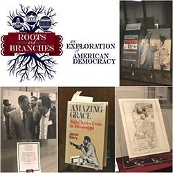 Photos from inside the Roots Exhibit. Pictured are books and maps.