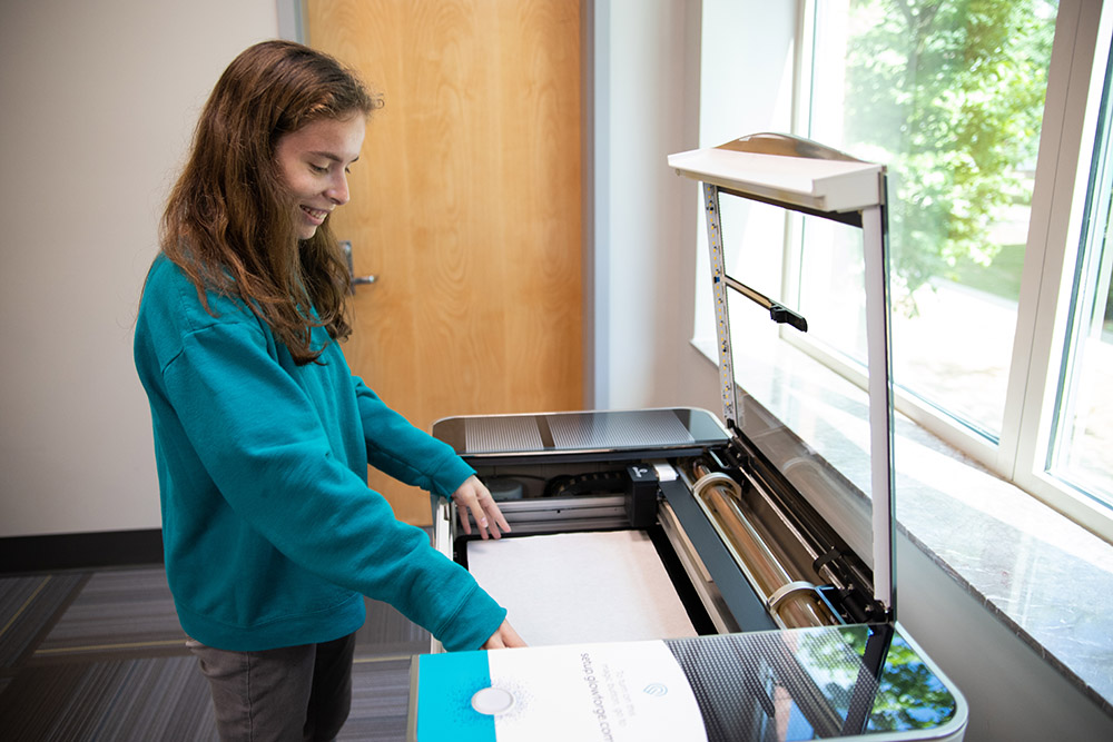 Image of student using the Glowforge