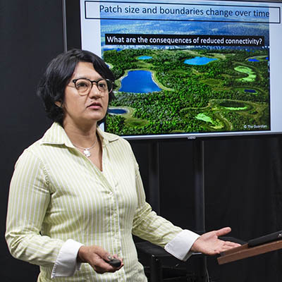 A professor records a lecture in the AV Studio.