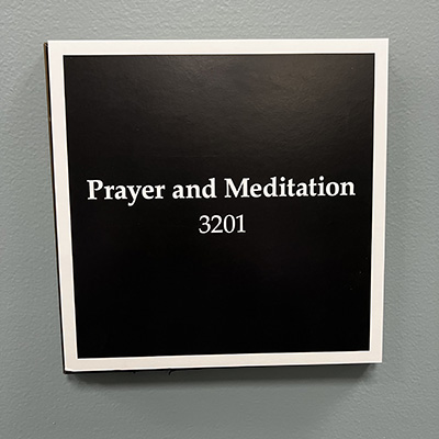 Sign for the Interfaith Prayer and Meditation Room.