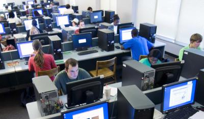 Students working at computer work stations.